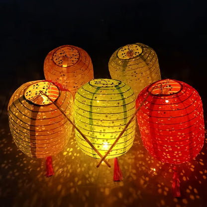 12 Pack Paper Lanterns with LED Lights 6.3 Inch Oval Chinese Decor | Warm lighting effect; Decorative hanging style; Festive party atmosphere; Easy display setup; Creative event accent