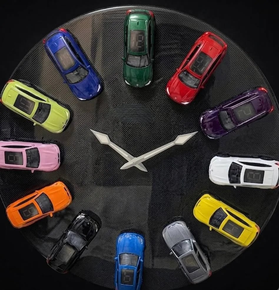 Close product view of sports car wall clock with twelve colorful car hour markers