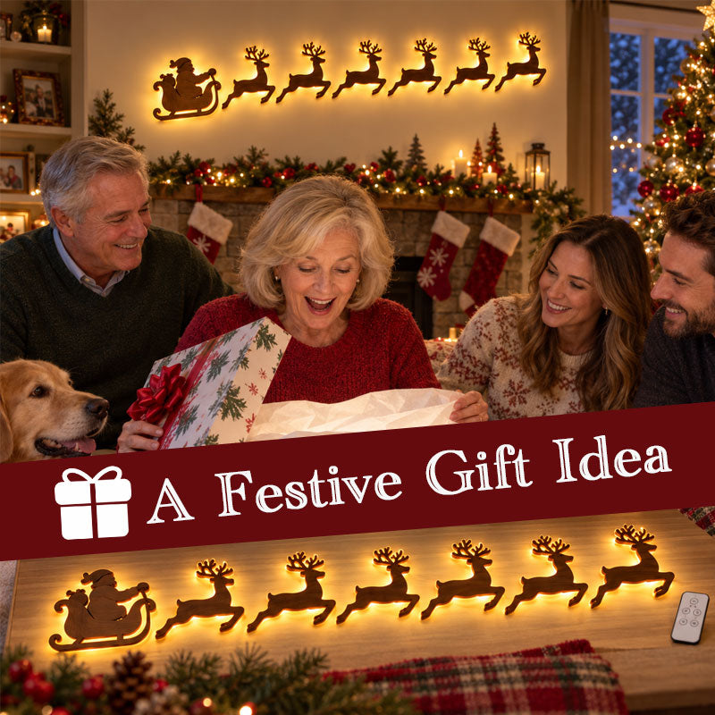 Family opening Christmas gift with illuminated Santa sleigh and reindeer wall display