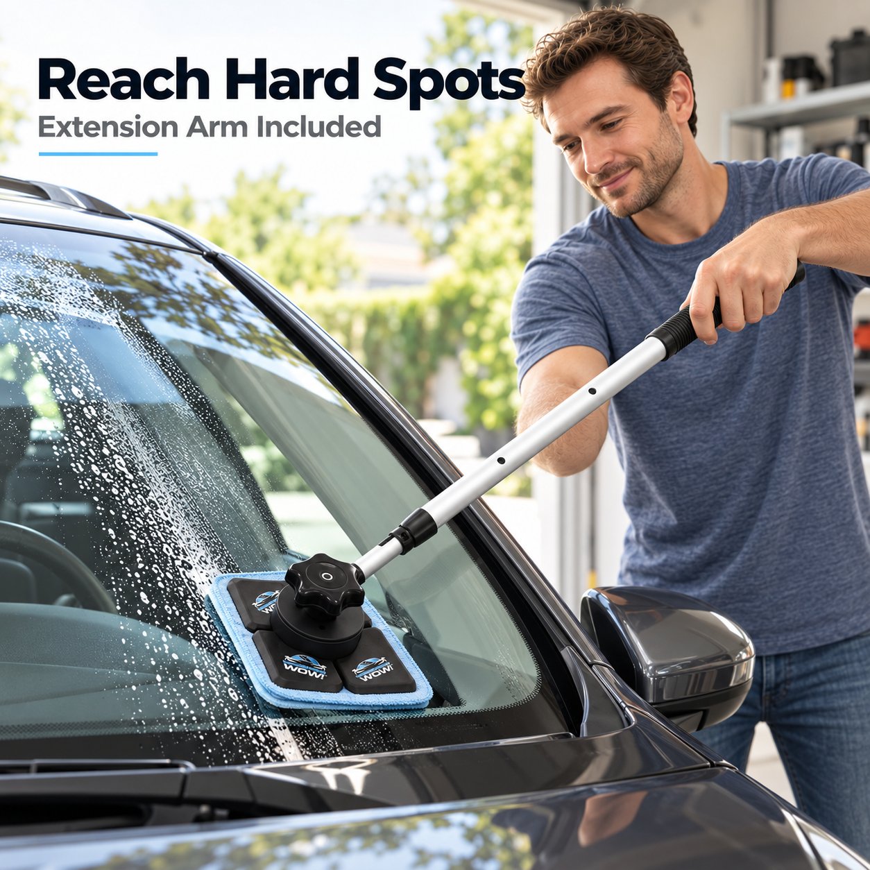 Extension handle reaching lower hard-to-clean area of automotive windshield