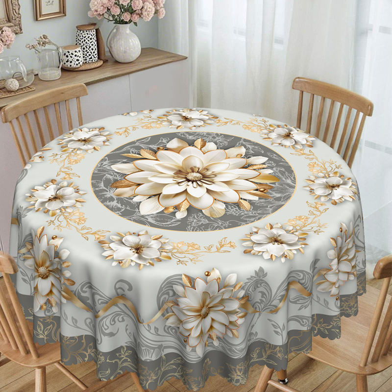 Round dining table covered with floral embossed tablecloth